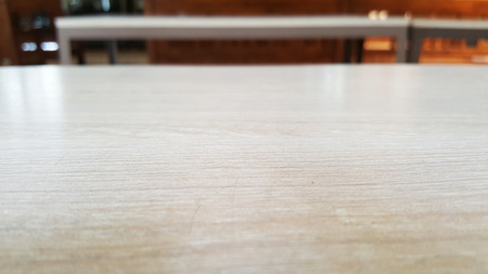 empty light cream wooden table for restaurant, webpage, picture frame advertising chart boardの写真素材
