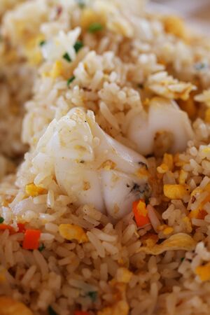 close-up Asian Chinese Fried Rice with shrimp, Vegetable and Egg at street food restaurant in Thailandの写真素材