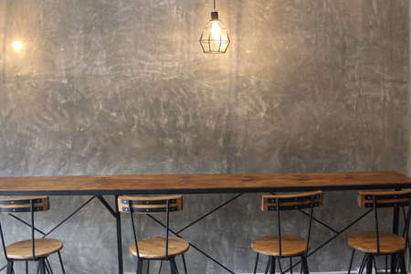 Decorating Living room interior in loft, industrial style, Coffee shop restaurant office work space, Loft empty room 3d render backgroundsの写真素材