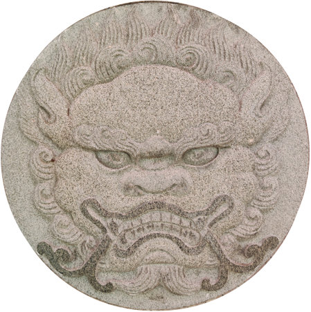 Stone Lion head medallion   flat sculpture with rough texture isolated on white backgrounds, decoration element designの写真素材