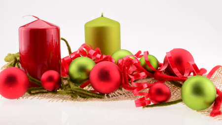 Christmas Decoration with Green and Red Candlesの写真素材