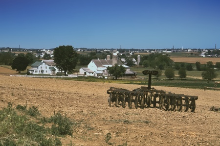 Amish Farm Equipment seating In The Fields on a Summer Dayの写真素材