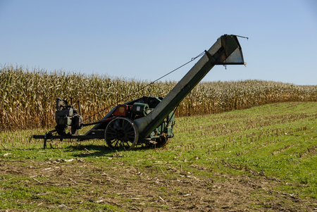 Amish Harvesting Equipment in the Field on an Autumn Dayの写真素材