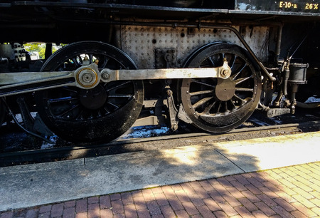 Steam Locomotive Warming up a Train Station on a summer Day