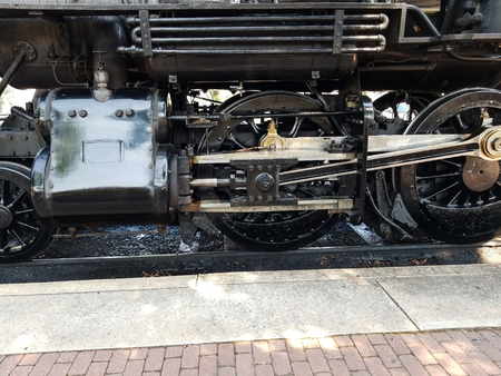 Steam Locomotive Warming up a Train Station on a summer Dayの写真素材