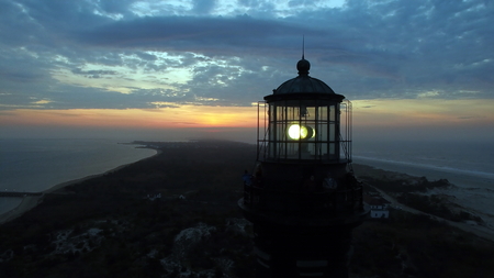 Aerial View of Sunrise at lighthouse on Long Island on a Spring Morning by a Droneの写真素材