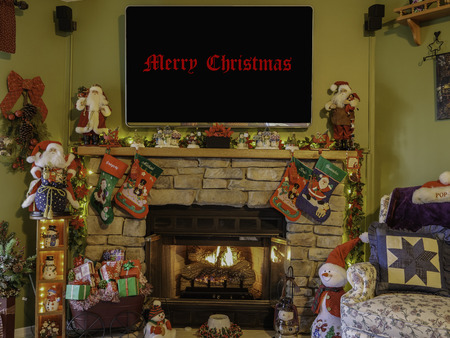 Interior Christmas Display with Fireplace and Decorationsの写真素材