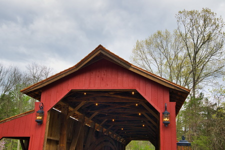 Restored Burr Arch Covered Bridge as Seen on a Spring Dayの写真素材
