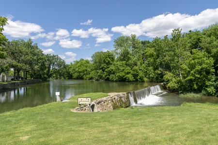Amish Countryside with a Man Made Waterfall by a Millの写真素材