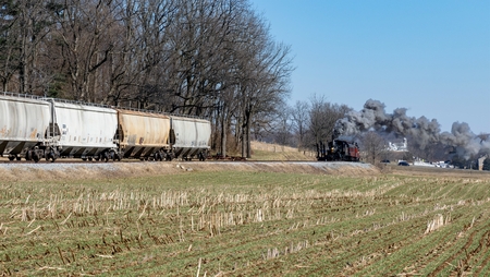 Steam Locomotive and Freight Hopper Cars in Amish Countrysideの写真素材