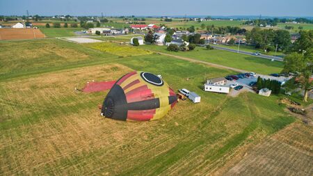 Aerial View of Hot Air Balloons Trying to Launch in a Wind as Seen by a Droneの写真素材