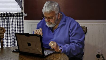 Senior Citizen Upset and Mad at Using a Computer and Technologyの写真素材