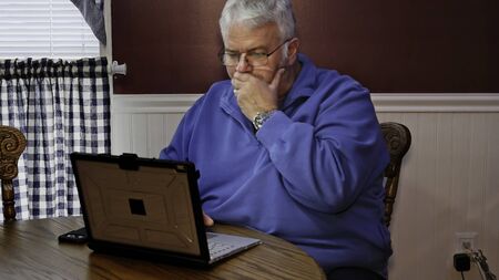 Senior Citizen Upset and Mad at Using a Computer and Technologyの写真素材