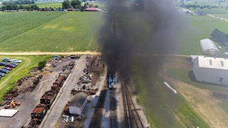 Aerial View of Train Yard Waiting for Thomas the Train Puffing Smoke on a Sunny Summer Dayの写真素材