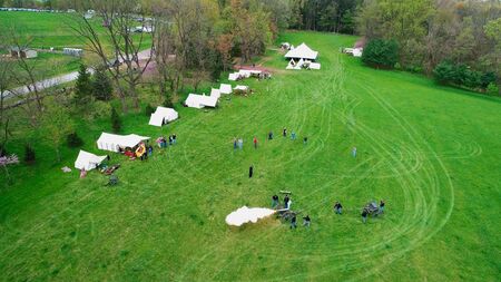 Aerial View of a Civil War Reenactment Cannon Firing on a Sunny Summer Day as Seen by a Droneの写真素材