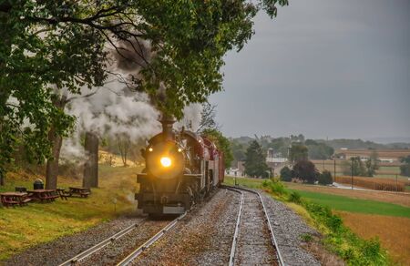 Lancaster, Pennsylvania, October 2019 - Norfolk and Western Steam Locomotive no. 611 and no. 382 Double Heading Freight Train on a Rainy Dayのeditorial素材