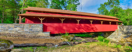 Close Up View of a Restored Old 1844 Covered Bridge on a Sunny Spring Day Panaramaの写真素材