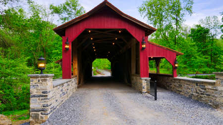 Close Up View of a Restored Old 1844 Covered Bridge on a Sunny Spring Dayの写真素材