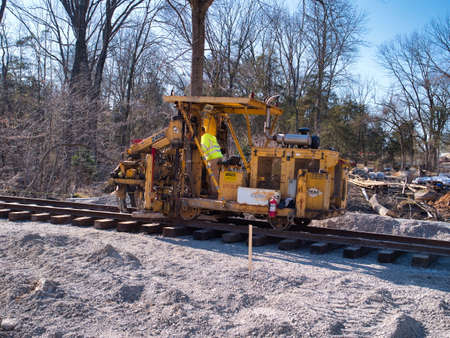 Restoring an Old Railroad Train Track on an Old Right of Wayの写真素材
