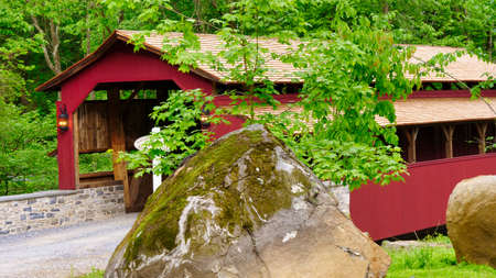 Close Up View of a Restored Old 1844 Covered Bridge on a Sunny Spring Dayの写真素材