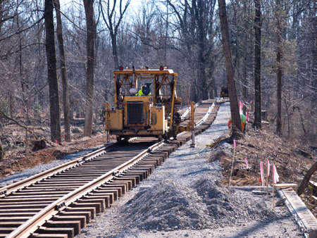 Restoring an Old Railroad Train Track on an Old Right of Wayの写真素材