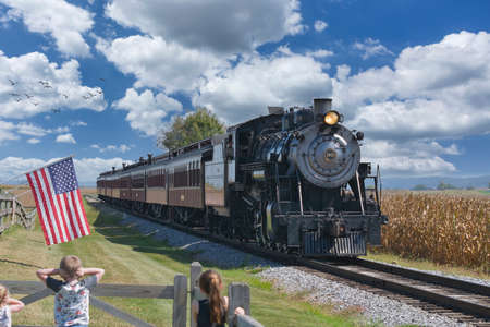 Ronks, Pennsylvania, September 2019 - View of an Antique Passenger Train Approaching with Restored Coachesのeditorial素材