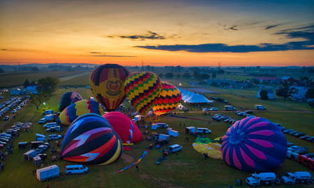 Bird in Hand, Pennsylvania, September 2019 - Aerial View of Many Hot Air Balloons Getting Ready to Take Off On An Early Morning Balloon Festivalのeditorial素材