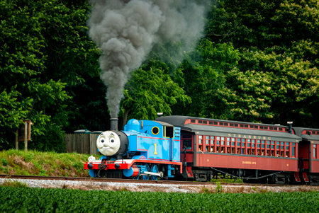 Strasburg, Pennsylvania. June 48 2021 - View of Thomas the Train Pulling Passenger Cars Blowing...