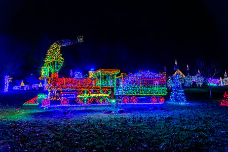 A View of a Large LED Steam Engine, With All Colors and Motorized, in a Large Drive Thru Display