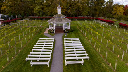 Elizabethtown, Pennsylvania, October 22, 2023 - An Aerial View of a Large Gazebo in the Middle of a Vineyard, With Seating for a Weddings on an Autumn Dayのeditorial素材