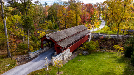 Elizabethtown, Pennsylvania, October 22, 2023 - An Aerial View of a Burr Truss Covered Bridge...