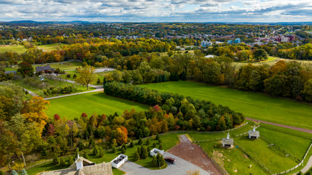 Elizabethtown, Pennsylvania, October 22, 2023 - An Aerial View of a Colorful Autumn Forest on a Sunny Fall Dayのeditorial素材