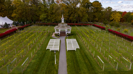 Elizabethtown, Pennsylvania, October 22, 2023 - An Aerial View of a Large Gazebo in the Middle of a Vineyard, With Seating for a Weddings on an Autumn Dayのeditorial素材