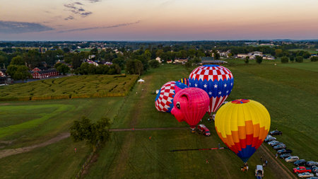 Bird in Hand, Pennsylvania, September 14, 2023 - An Aerial View on Many Hot Air Balloons Launching, in the Early Morning, From a Field in Rural America, on a Sunny Summer Dayのeditorial素材