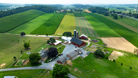 Paradise, Pennsylvania, USA, July 18. 2023 - An Aerial View of Farm Buildings and Vibrant Farmlandsのeditorial素材