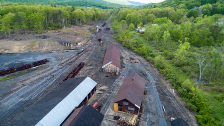 This location features an abandoned railway yard with tracks extending into the distance.の写真素材