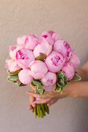 wedding bouquet of pink peoniesの写真素材