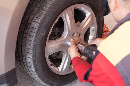 vulcanization work for the change of season rubberの写真素材