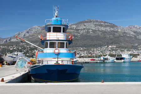 old fishing boat in the port berthのeditorial素材
