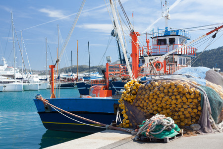 old fishing boat in the port berthのeditorial素材