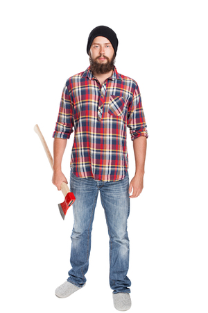 young bearded lumberjack posing with ax front viewの写真素材