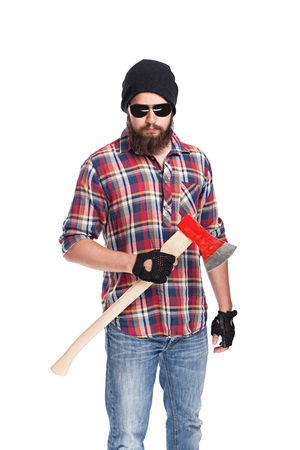 young bearded lumberjack posing with axの写真素材