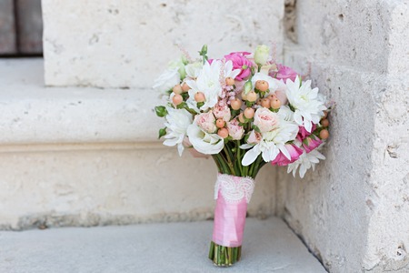 bridal bouquet on a stoneの写真素材