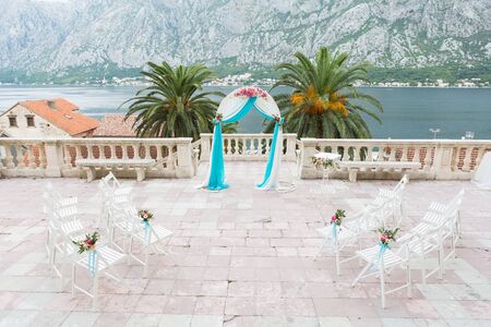 beautiful wedding arch for the ceremony of flowers.の写真素材