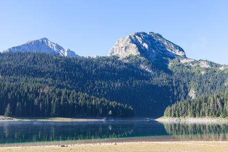 Beautiful mystical lake. Black Lake, Durmitor National Park. Montenegroの写真素材