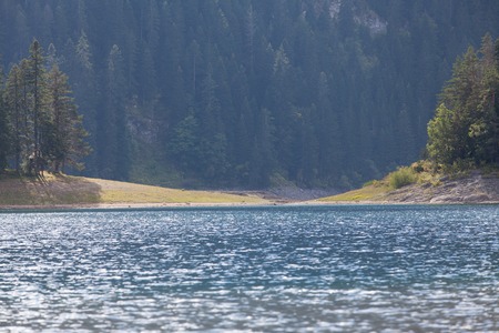 Beautiful mystical lake. Black Lake, Durmitor National Park. Montenegroの写真素材