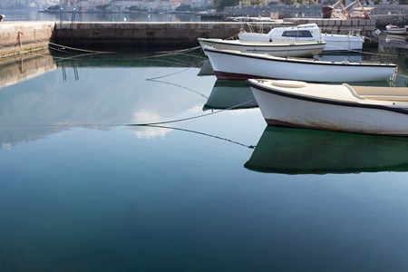 fishing boats tied up at the dock, Montenegroの写真素材