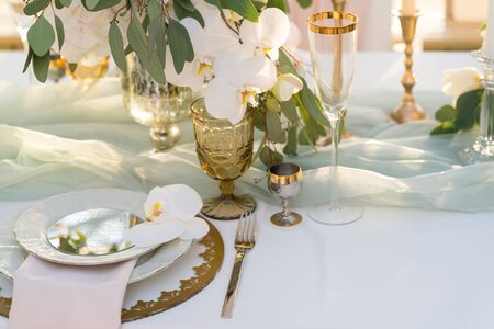 beautifully decorated table with flowers for wedding partyの写真素材