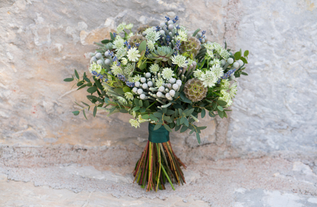 Wedding bouquet with lots of greeneryの写真素材