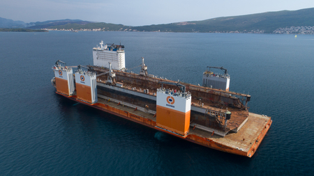 Tivat, Montenegro - 4 August 2017: Heavy lift vessel Dockwise Vanguard came to Montenegro to take the floating dockのeditorial素材